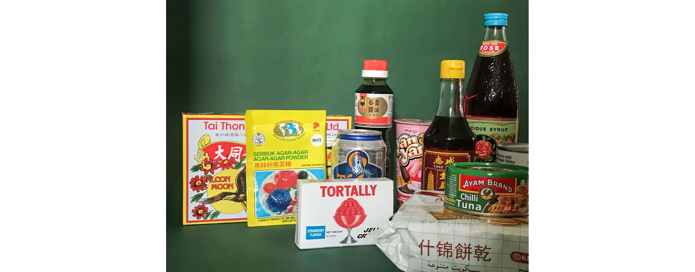 A variety of Singaporean packaged foods, condiments and drinks.