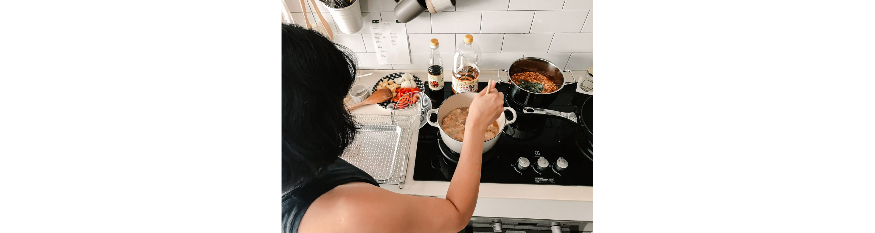 Melly Fong frying small pieces of pork.