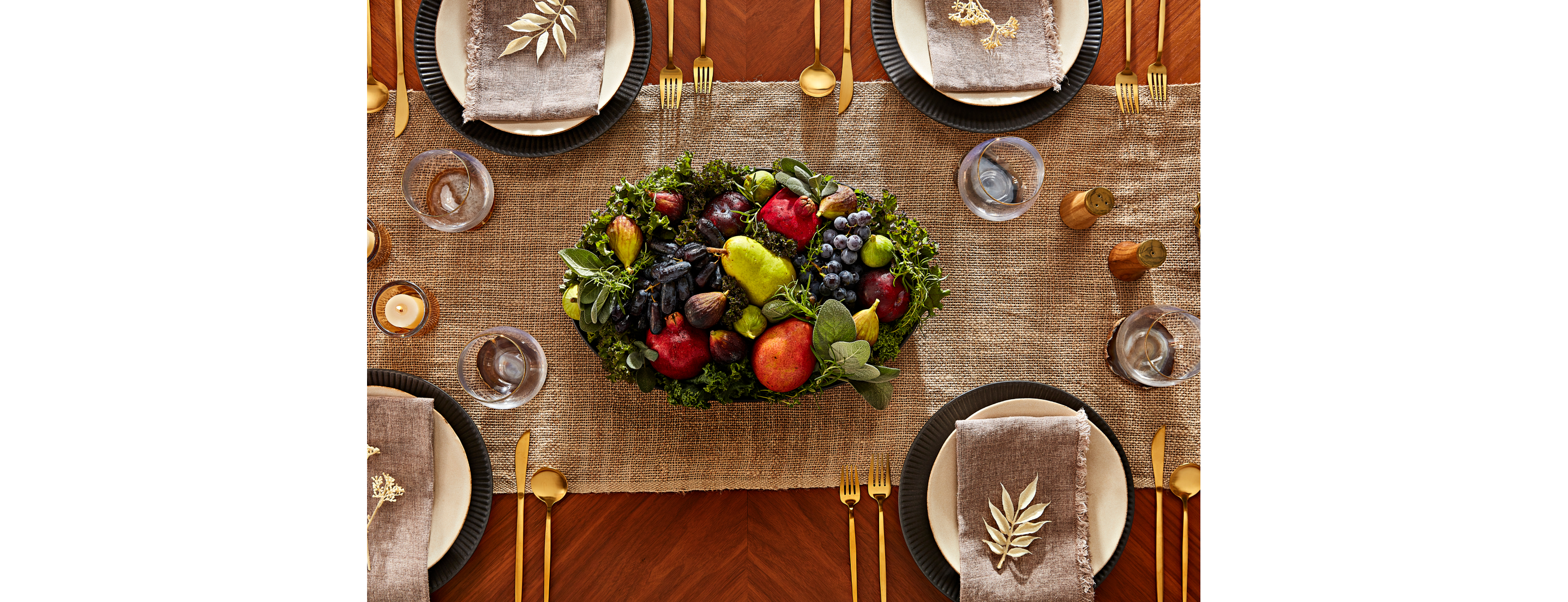 A set table with a colorful centerpiece