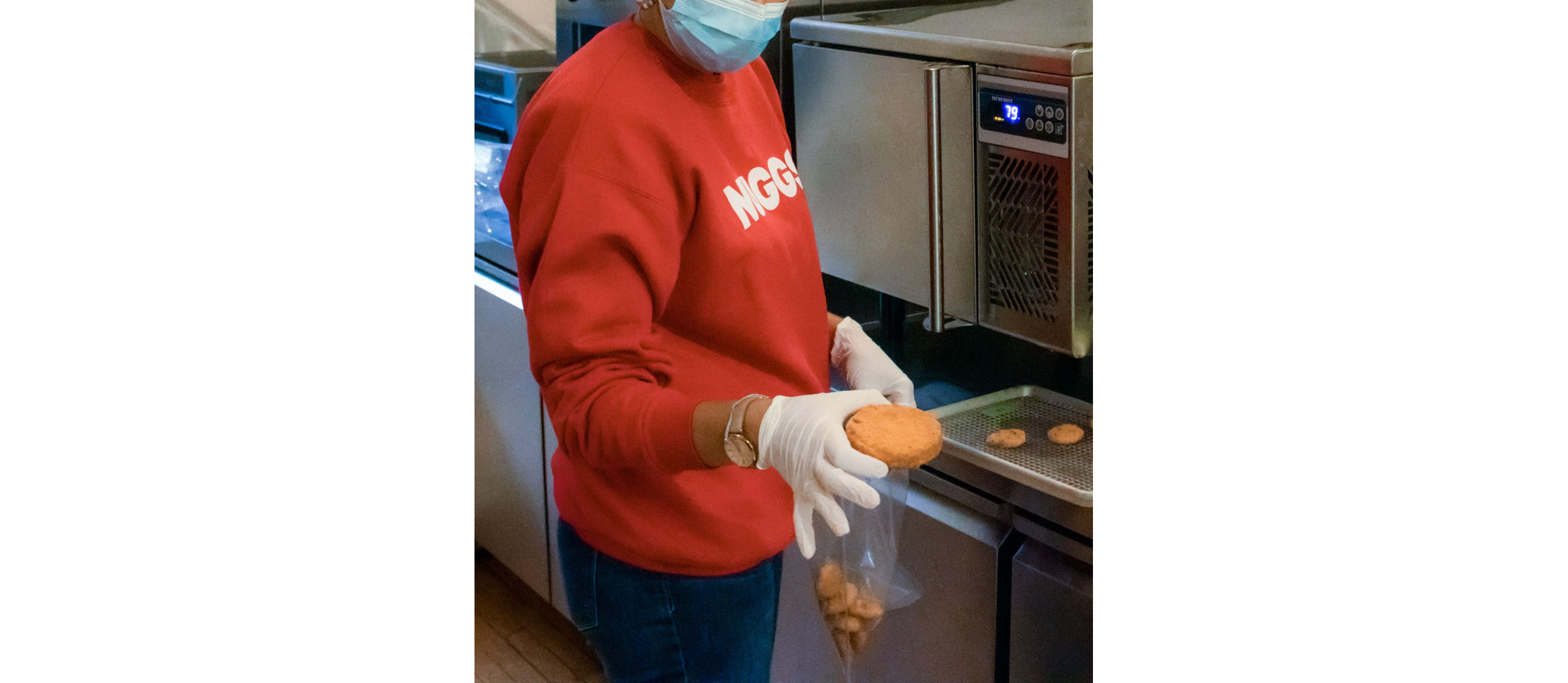 A person holding a plant-based chicken patty.