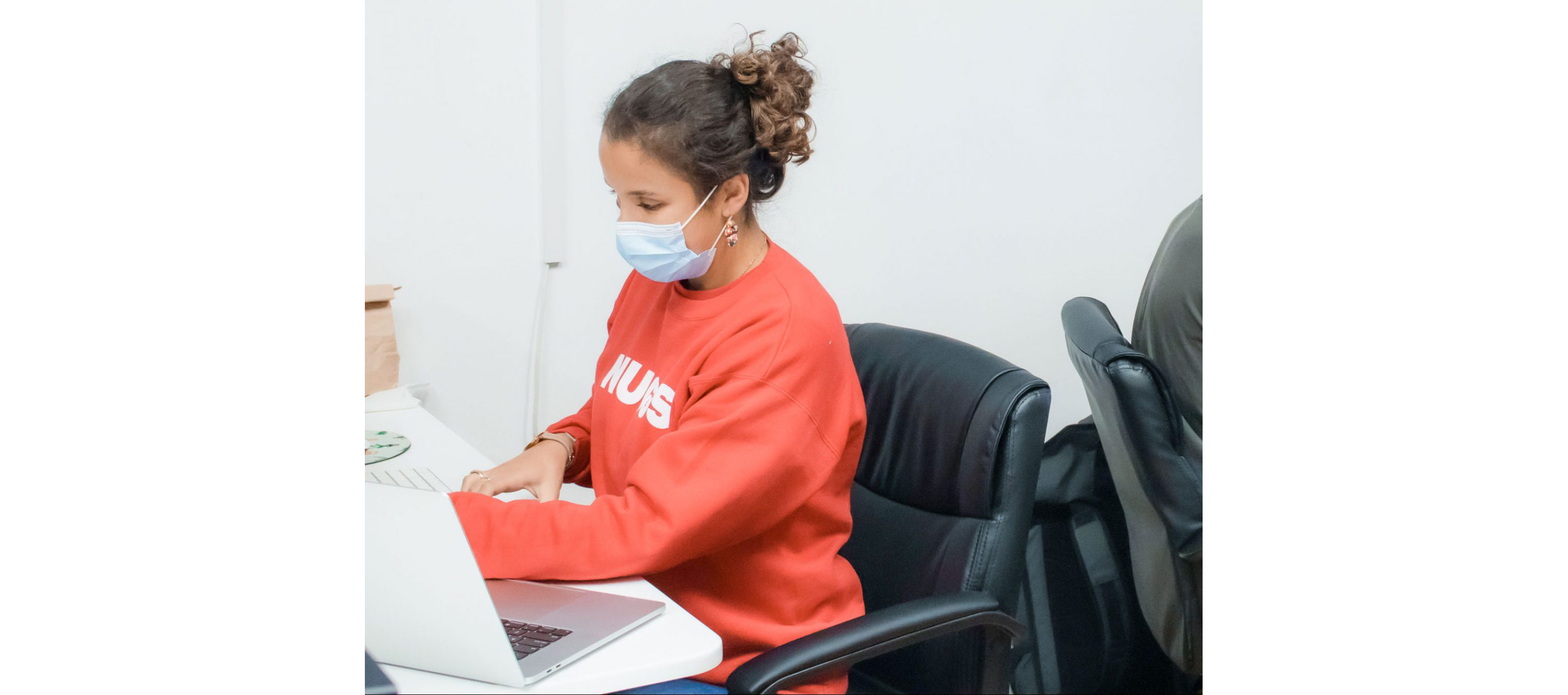 Gabriela, a Nuggs food engineer, working at her desk.
