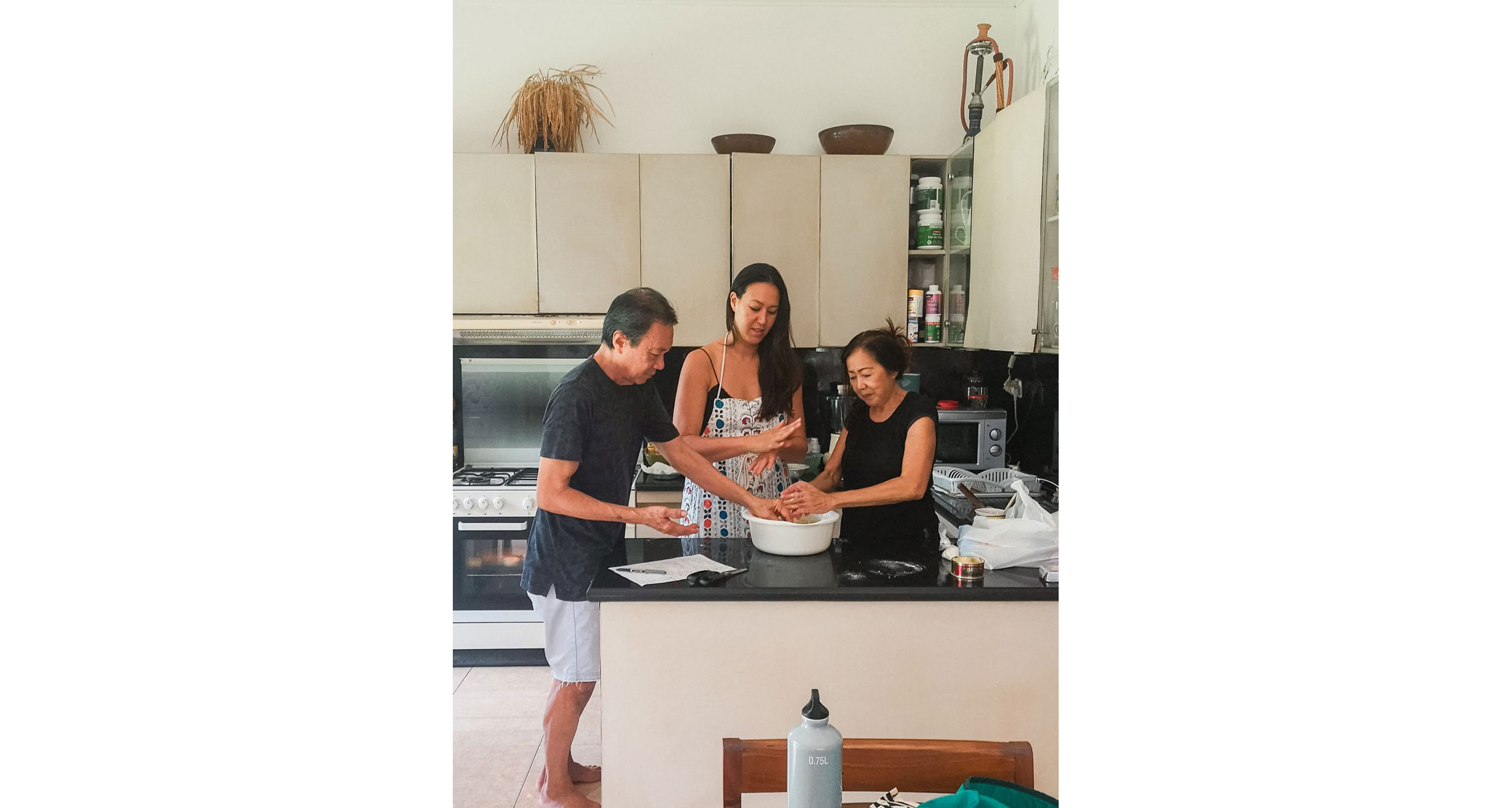 A family in a kitchen preparing jajanan pasar, Indonesian sweets.