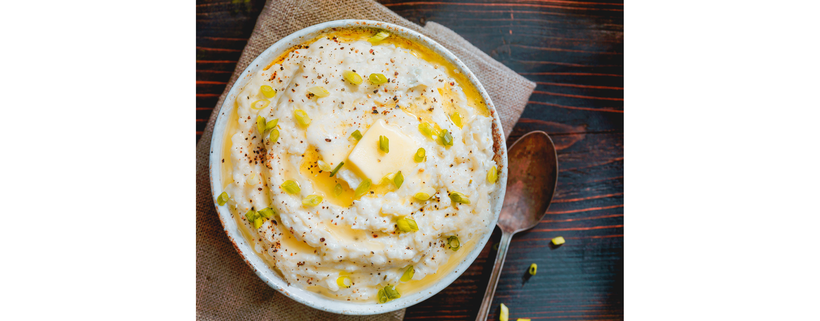 A large bowl of creamy cauliflower mash.