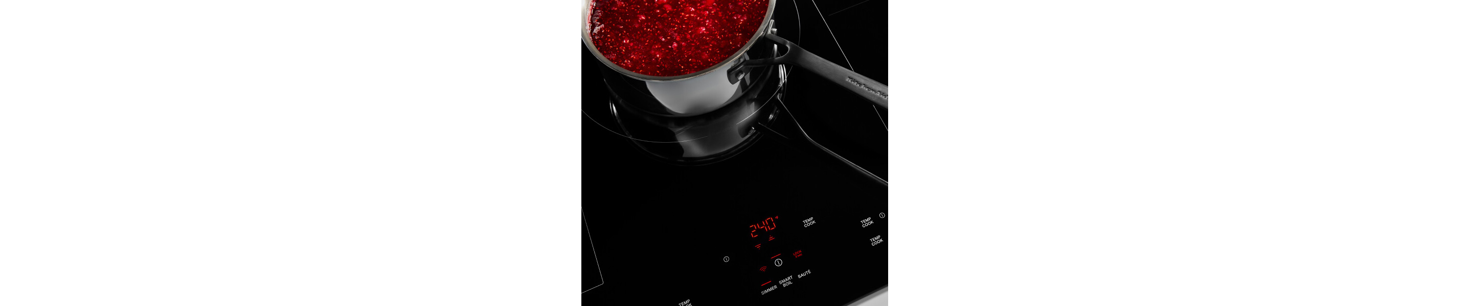Jam cooking in a saucepan on an induction cooktop