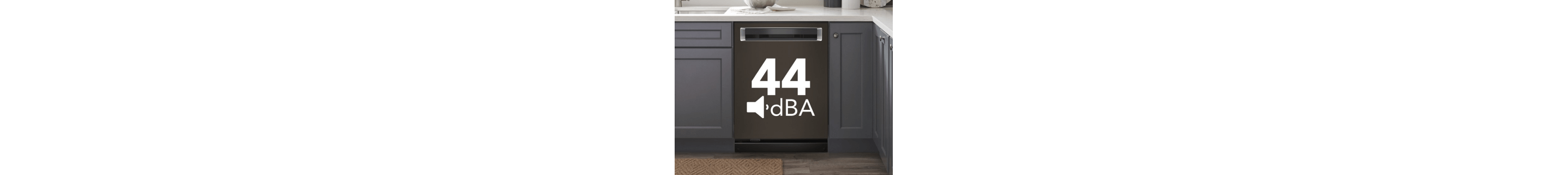 A built-in top control dishwasher with a pocket handle and a label that says 44 dBA on the door