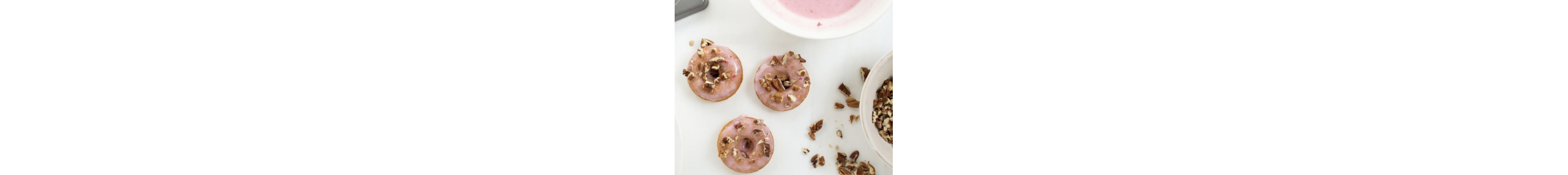 Cornbread doughnuts with cranberry glaze and pecans