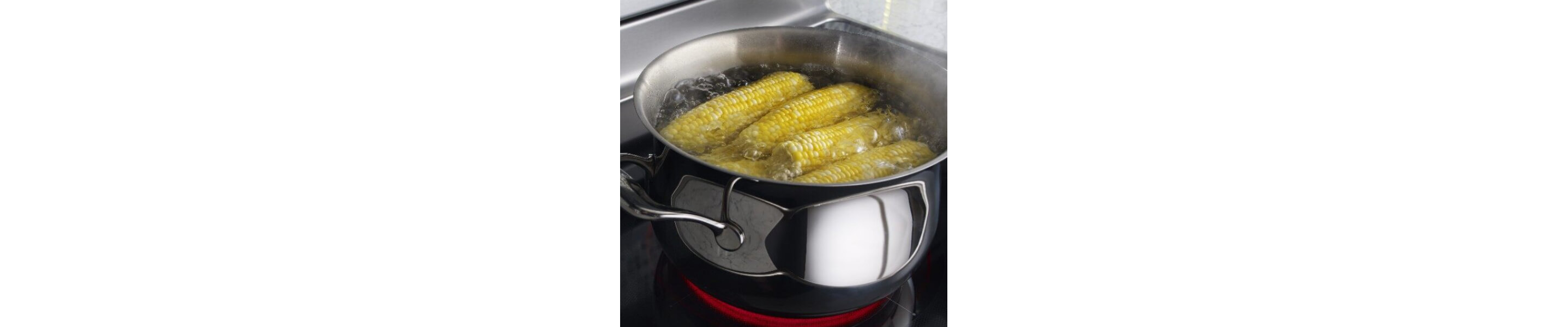 Corn boiling in a pot of water