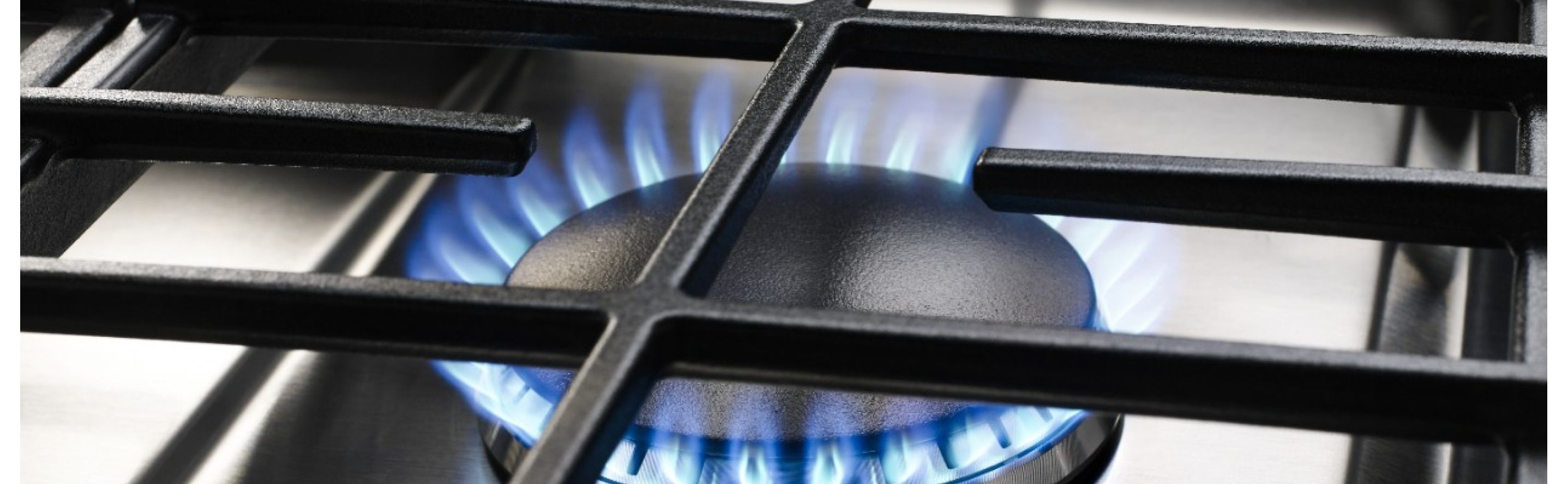 Close up image of a gas stovetop burner