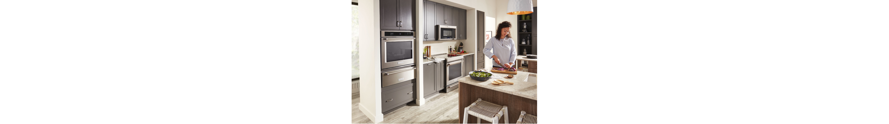 Person preparing food at a kitchen island