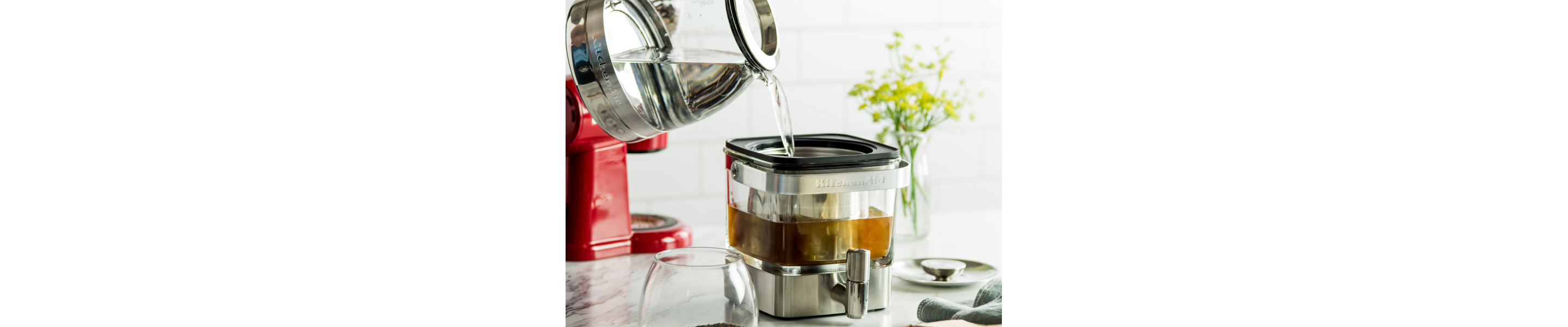 Water poured in a KitchenAid® cold brew maker