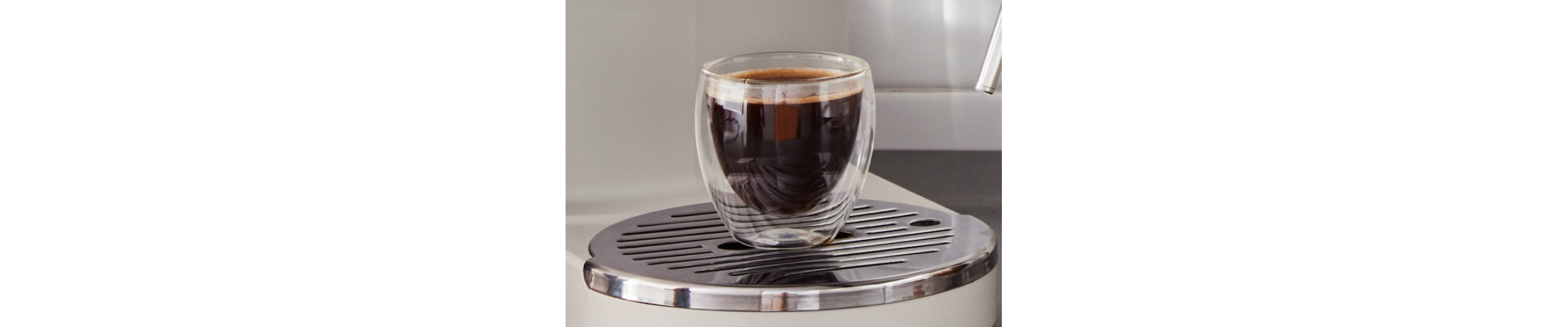 Glass cup of lungo