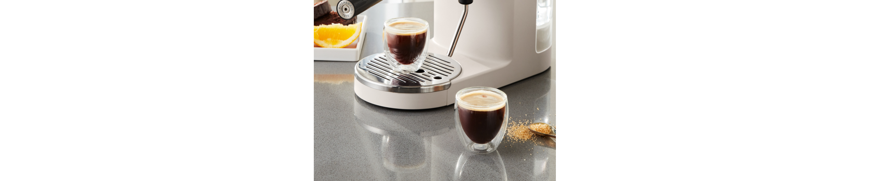 Espresso macchiato in glass shot glasses