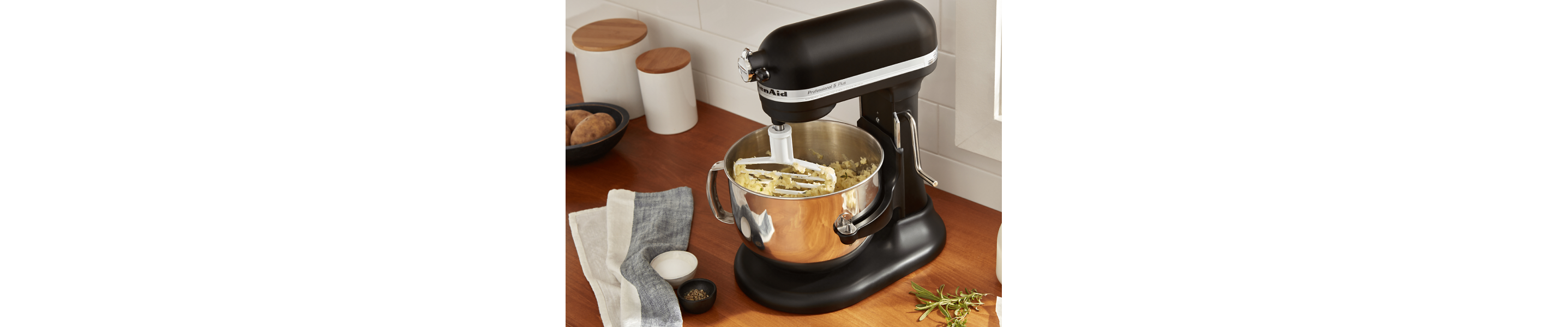 A KitchenAid® stand mixer mashing potatoes.