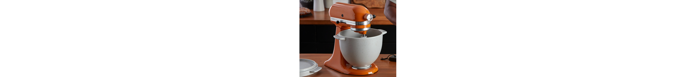 Orange KitchenAid® stand mixer with gray mixing bowl