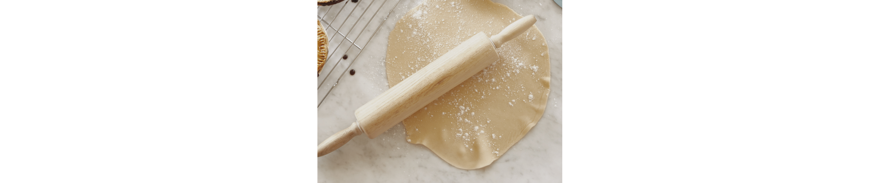 Rolled out dough and a rolling pin