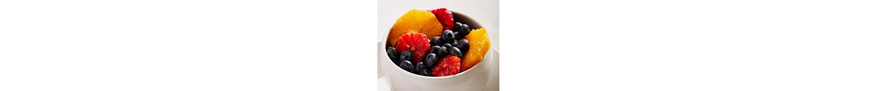 A bowl of colorful fruits
