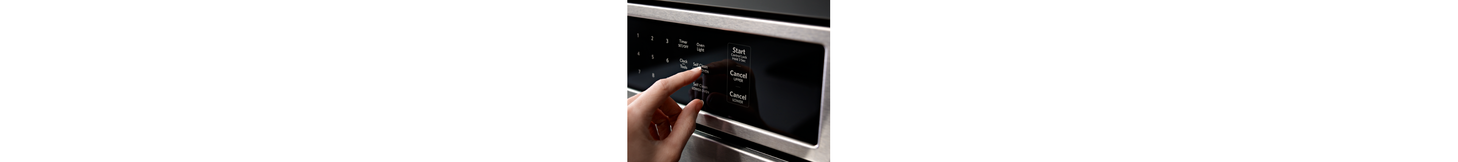  Woman starting the self-clean setting