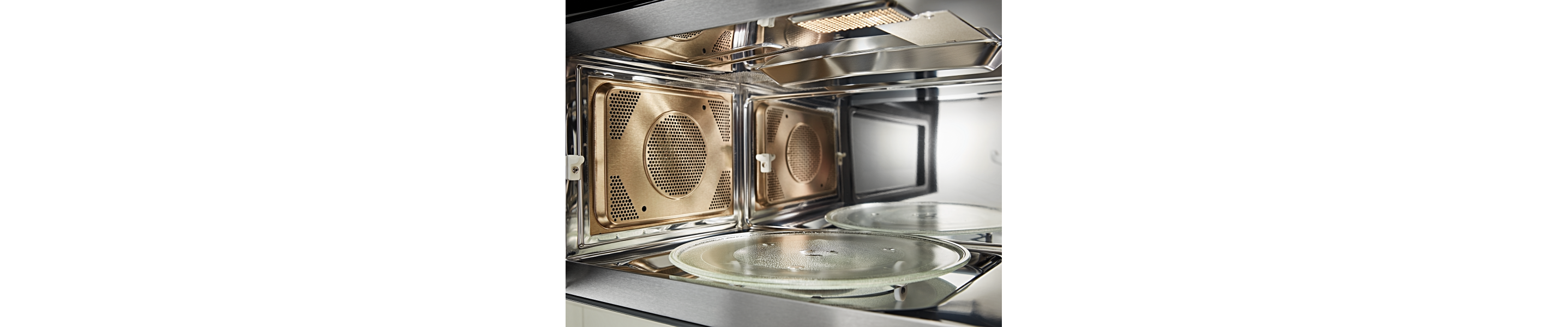 A closeup of the interior of a KitchenAid® microwave.