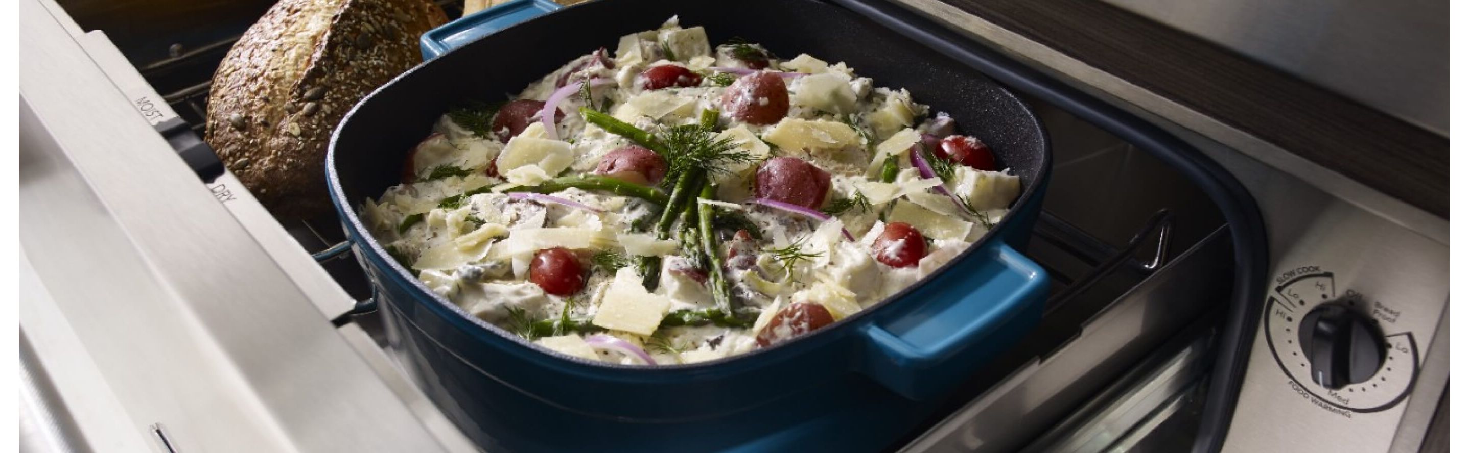 Close-up of garnished au gratin in a blue ceramic casserole dish