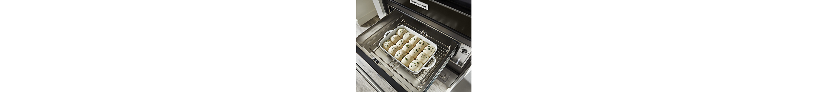Herb rolls proofing in a warming drawer