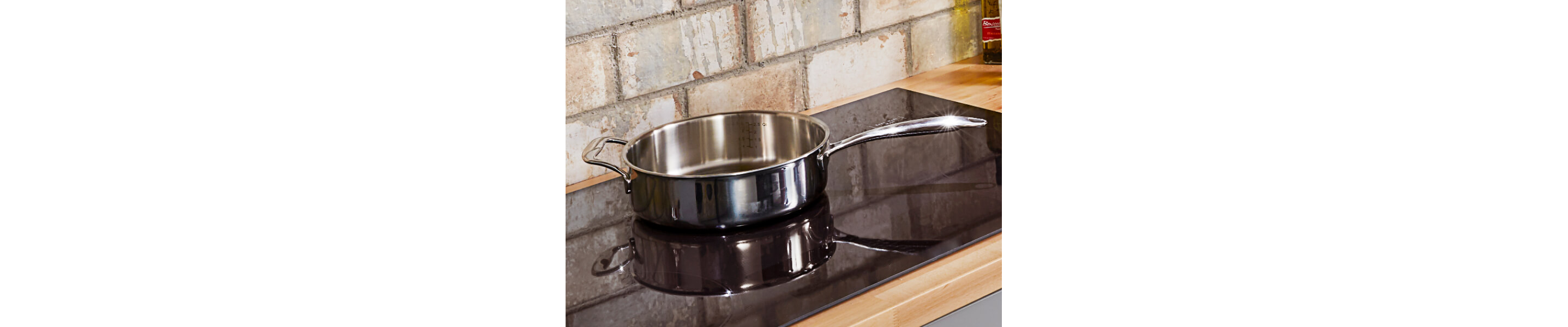 A saute pan on a cooktop