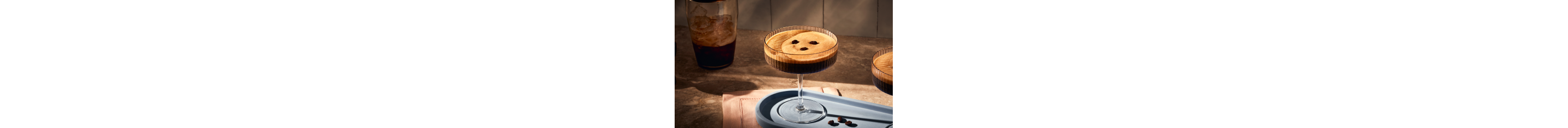 Espresso martini garnished with espresso beans