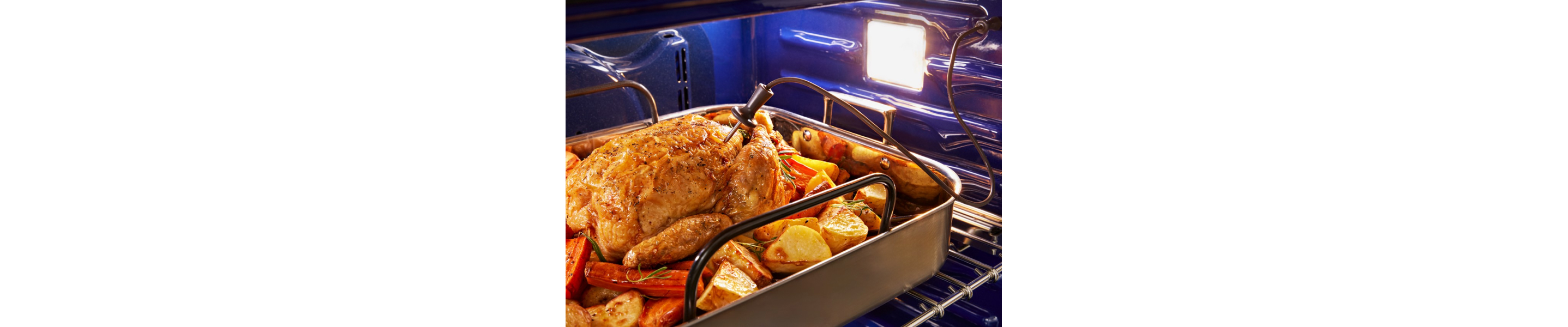 A turkey cooking in a KitchenAid® wall oven