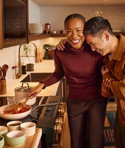 People embracing at Room to Host