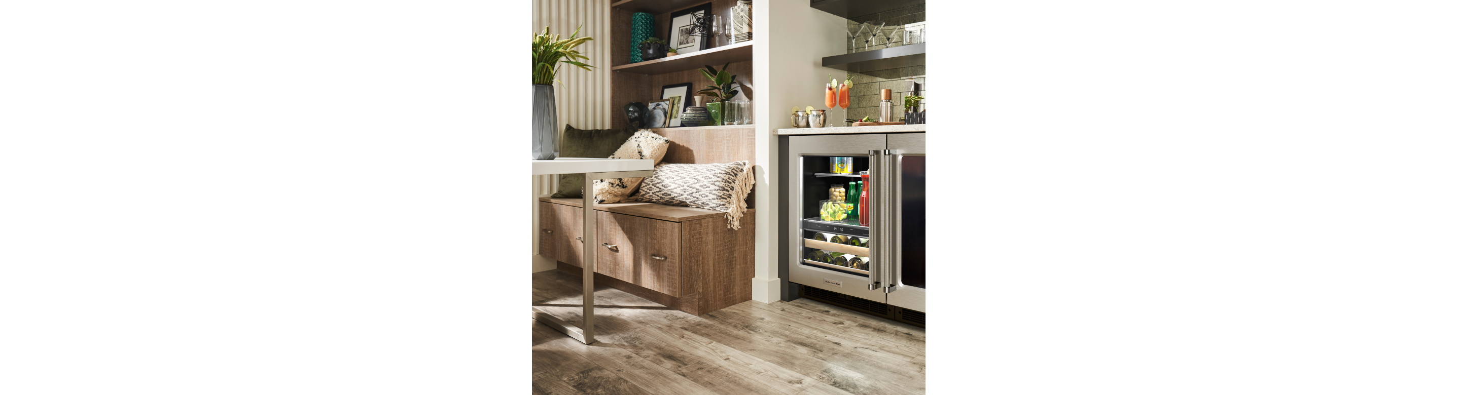 Undercounter refrigerator next to banquette
