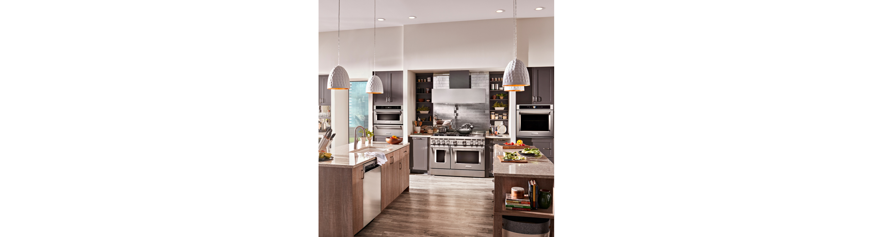 Pendant lights hanging over kitchen islands