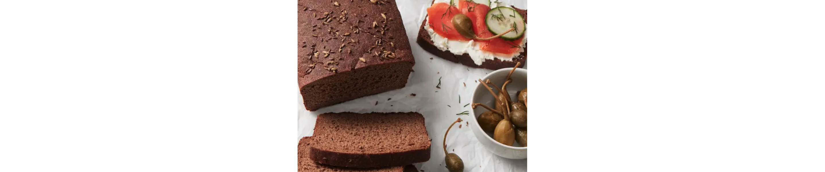 A homemade loaf of pumpernickel bread.