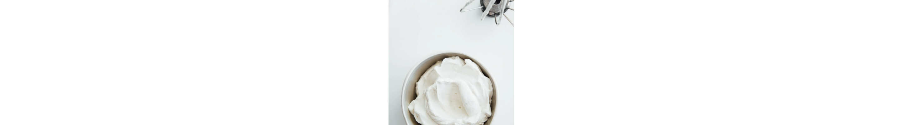 Birds-eye view of a bowl of aquafaba whipped cream
