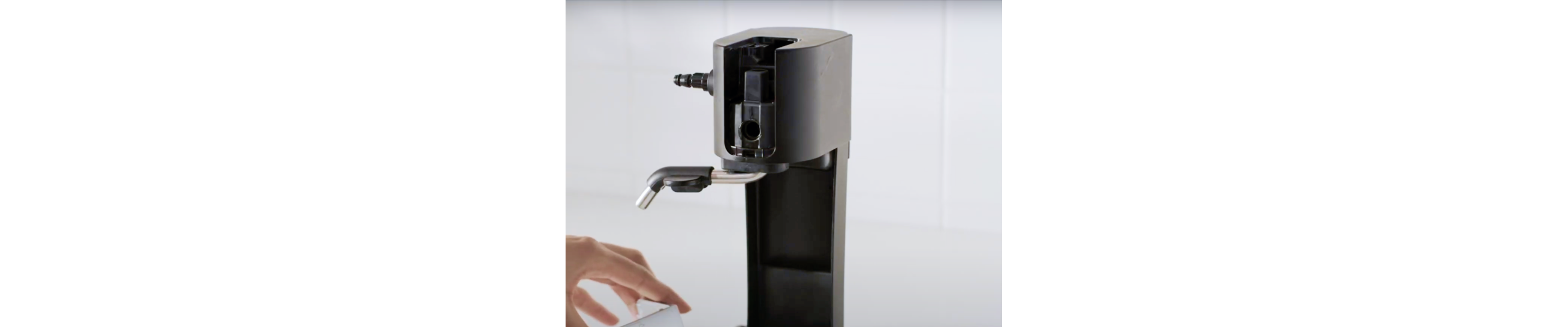 Close-up of disassembled milk frother attachment 