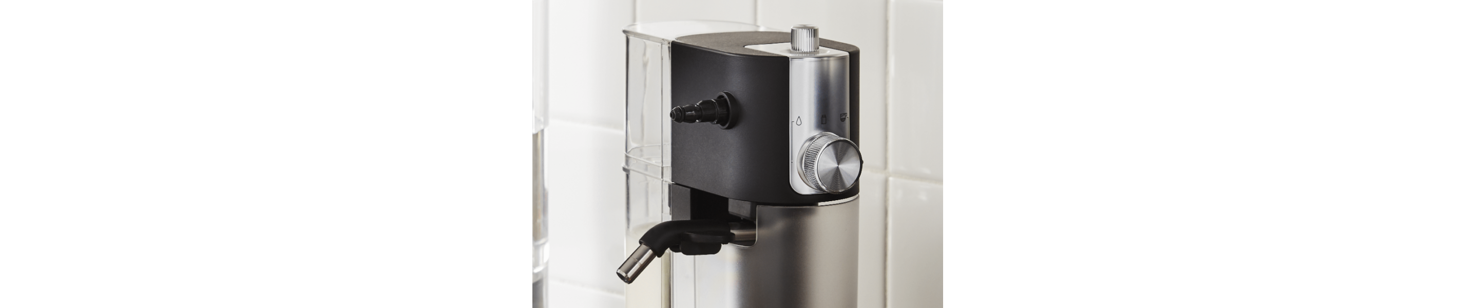 Close-up of black and silver milk frother