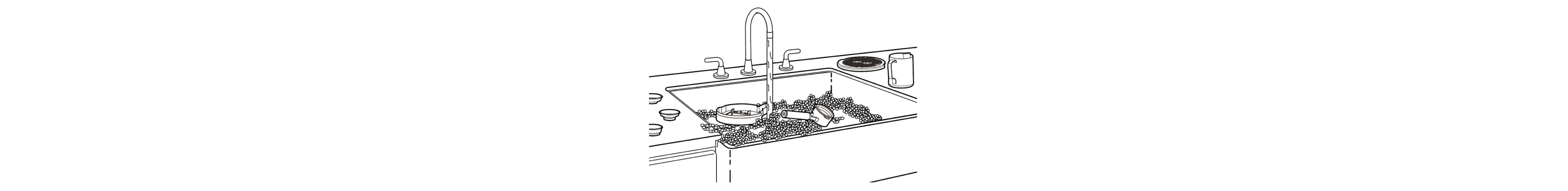 Sink filled with parts of espresso machine soaking in soapy water