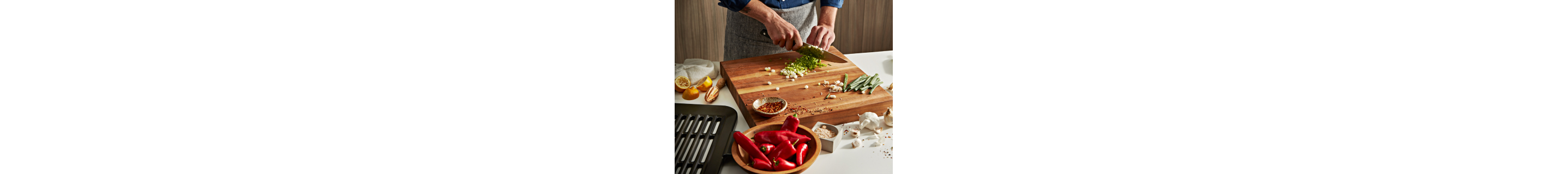 Person prepping ingredients on a cutting board