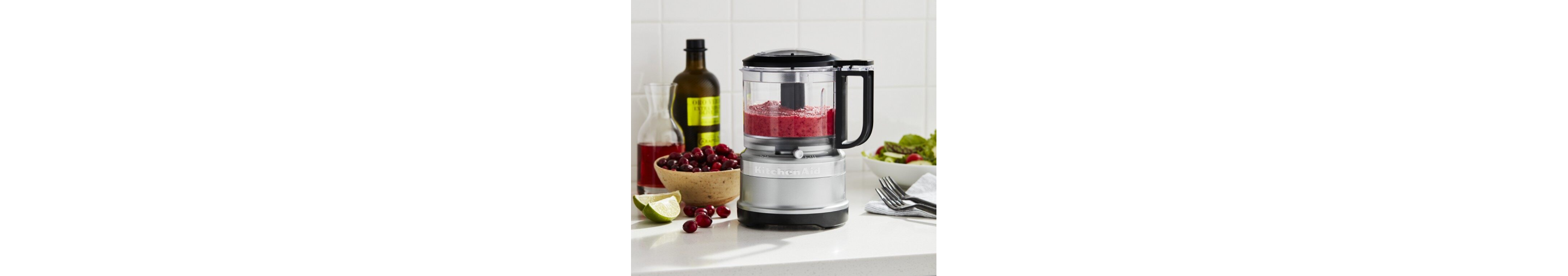 Contour Silver KitchenAid® food chopper filled with fruit puree