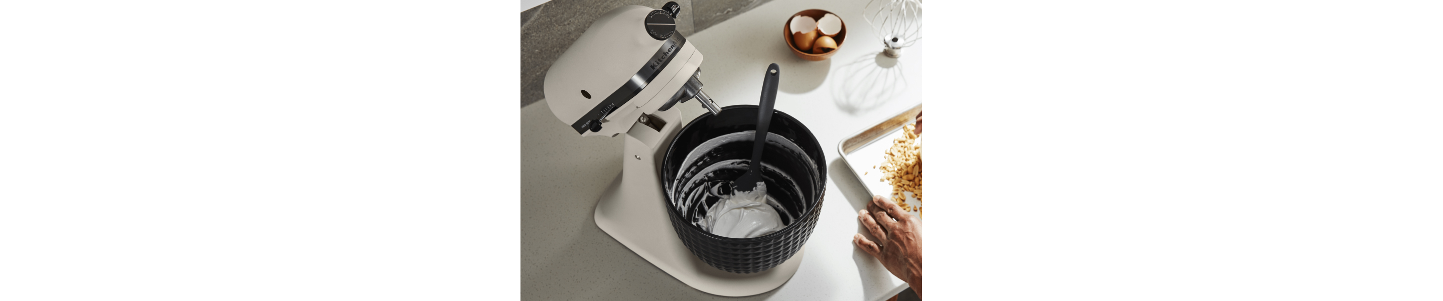 Whipped egg whites in a KitchenAid®  stand mixer mixing bowl. 