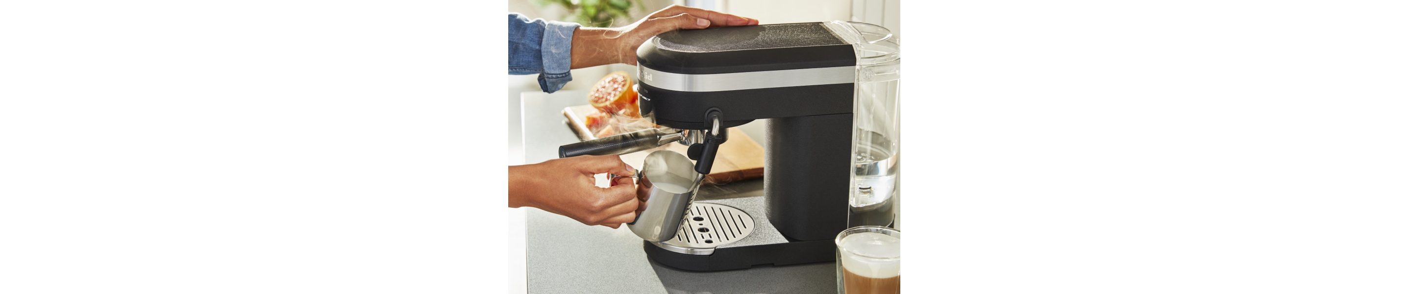 Milk being steamed with steam wand on a KitchenAid® Semi-Automatic Espresso Machine