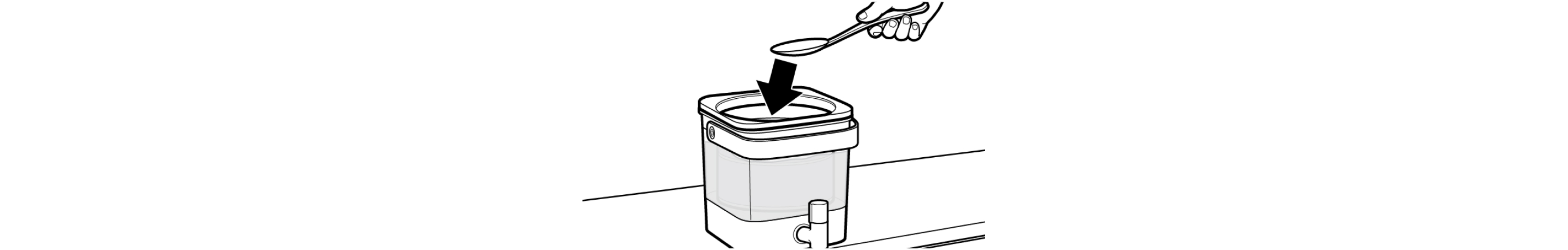 Hand using spoon to submerge cold brew coffee grounds in water