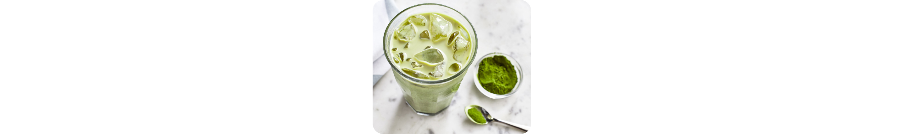 Looking down on a glass of ice matcha coffee
