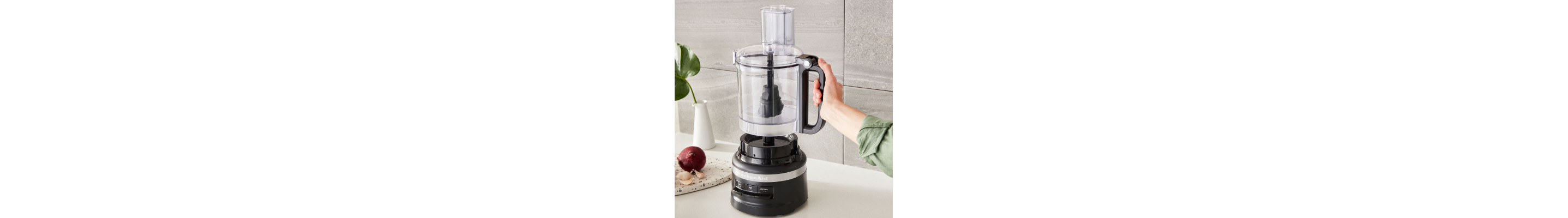 Person assembling a KitchenAid® food processor