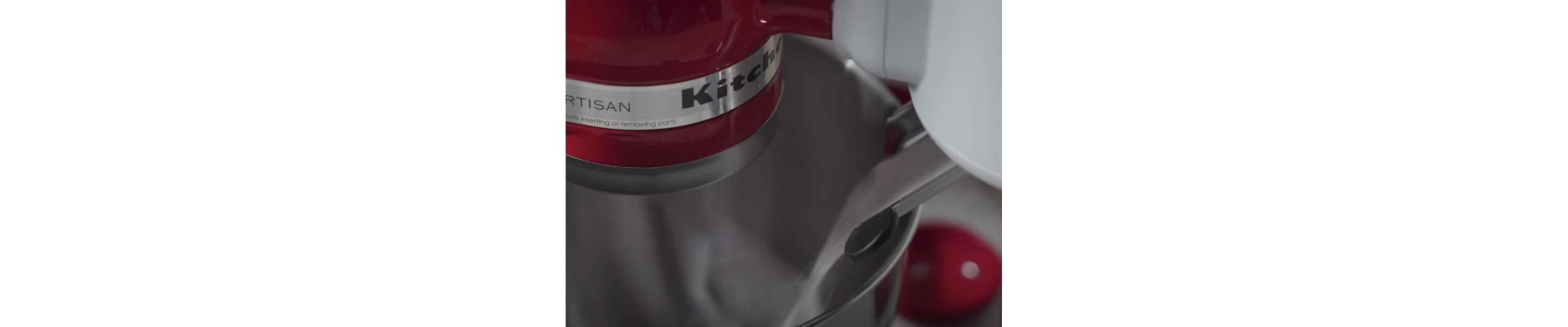 A close up of a mixer bowl