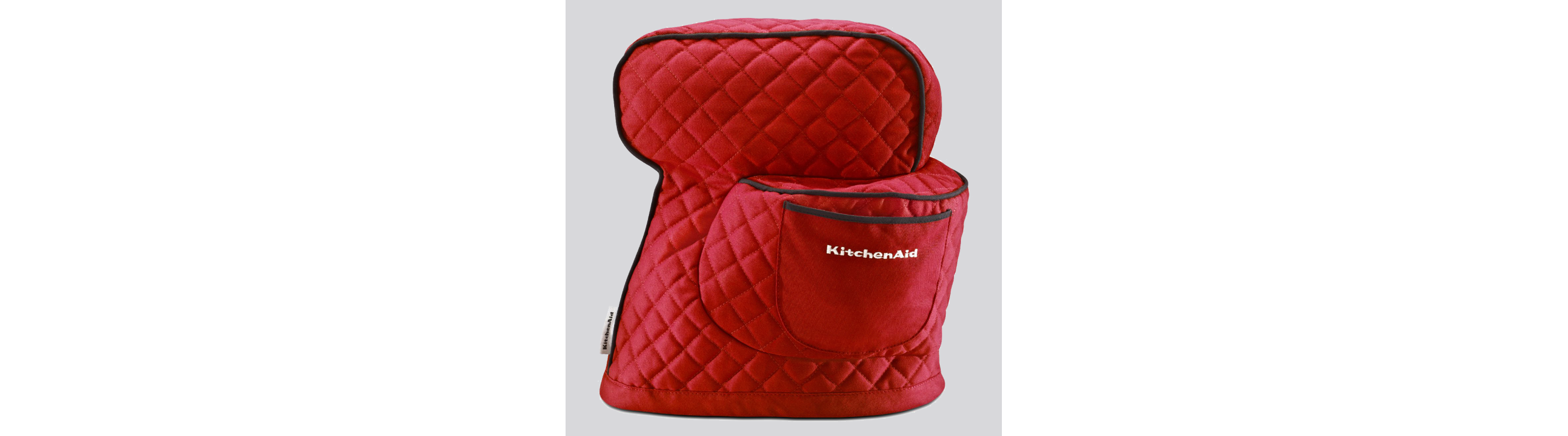 A red KitchenAid® stand mixer cover.