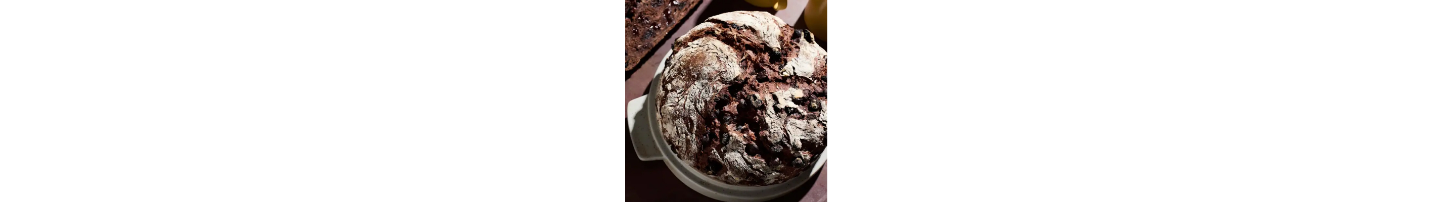 A loaf of chocolate cherry rye bread