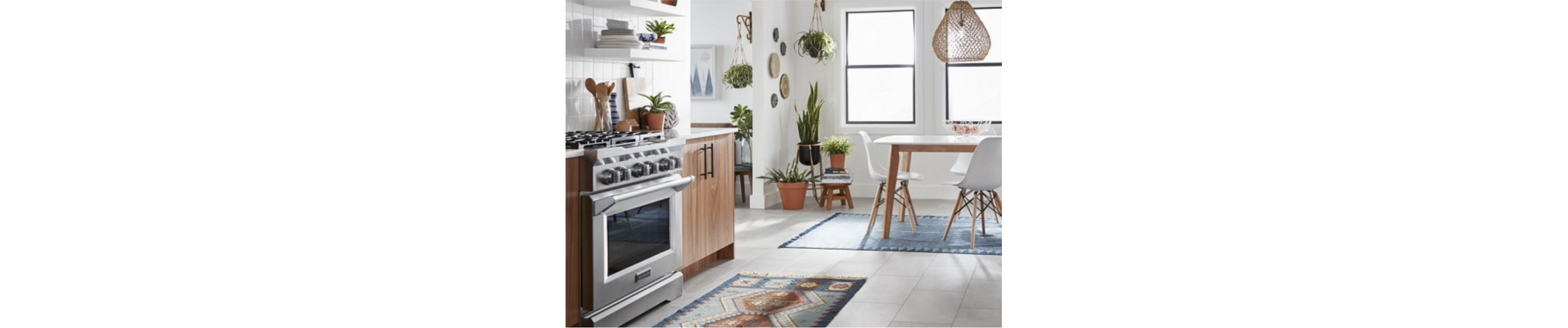 Stainless steel KitchenAid® gas range in a contemporary kitchen