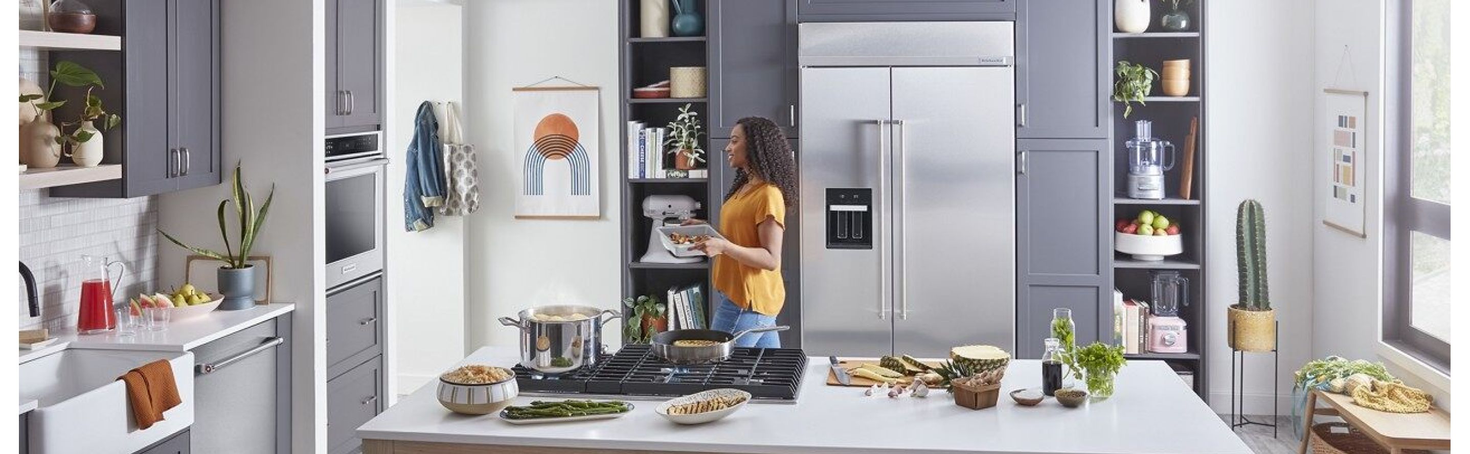 Person cooking a meal in a modern kitchen