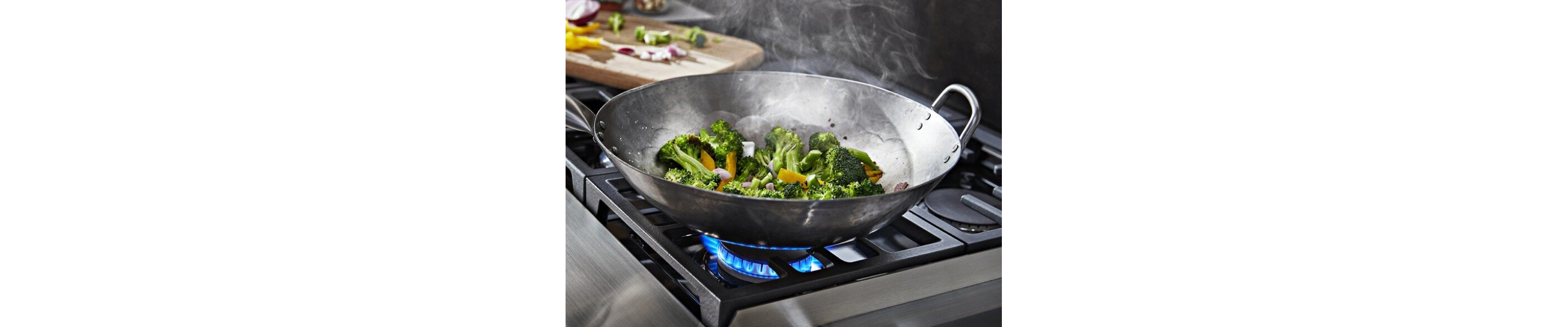 Broccoli simmering on a gas stovetop
