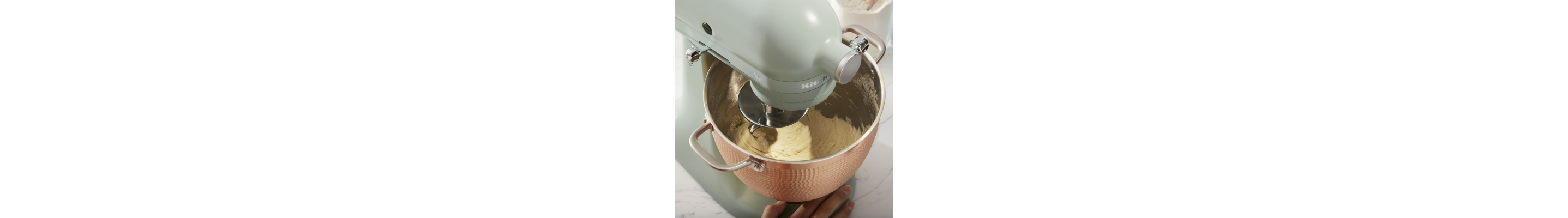 KitchenAid® stand mixer mixing dough