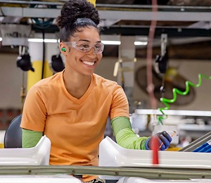 A person working in a product factory